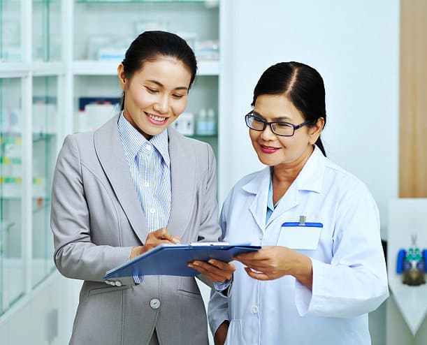 medical representative with pharmacist